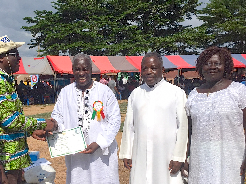 Msgr Simon awarded Best Fish Farmer for Aowin District